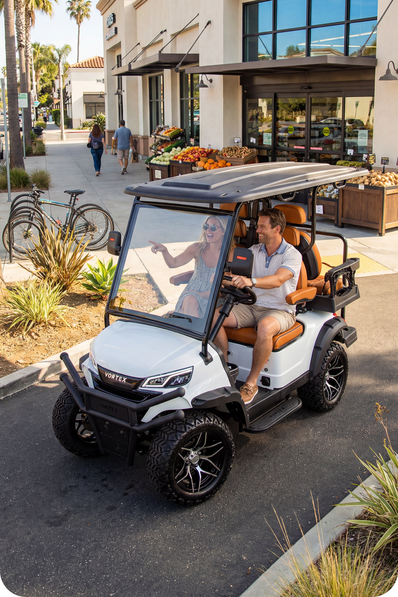 Couple riding Edge-EV through shopping area